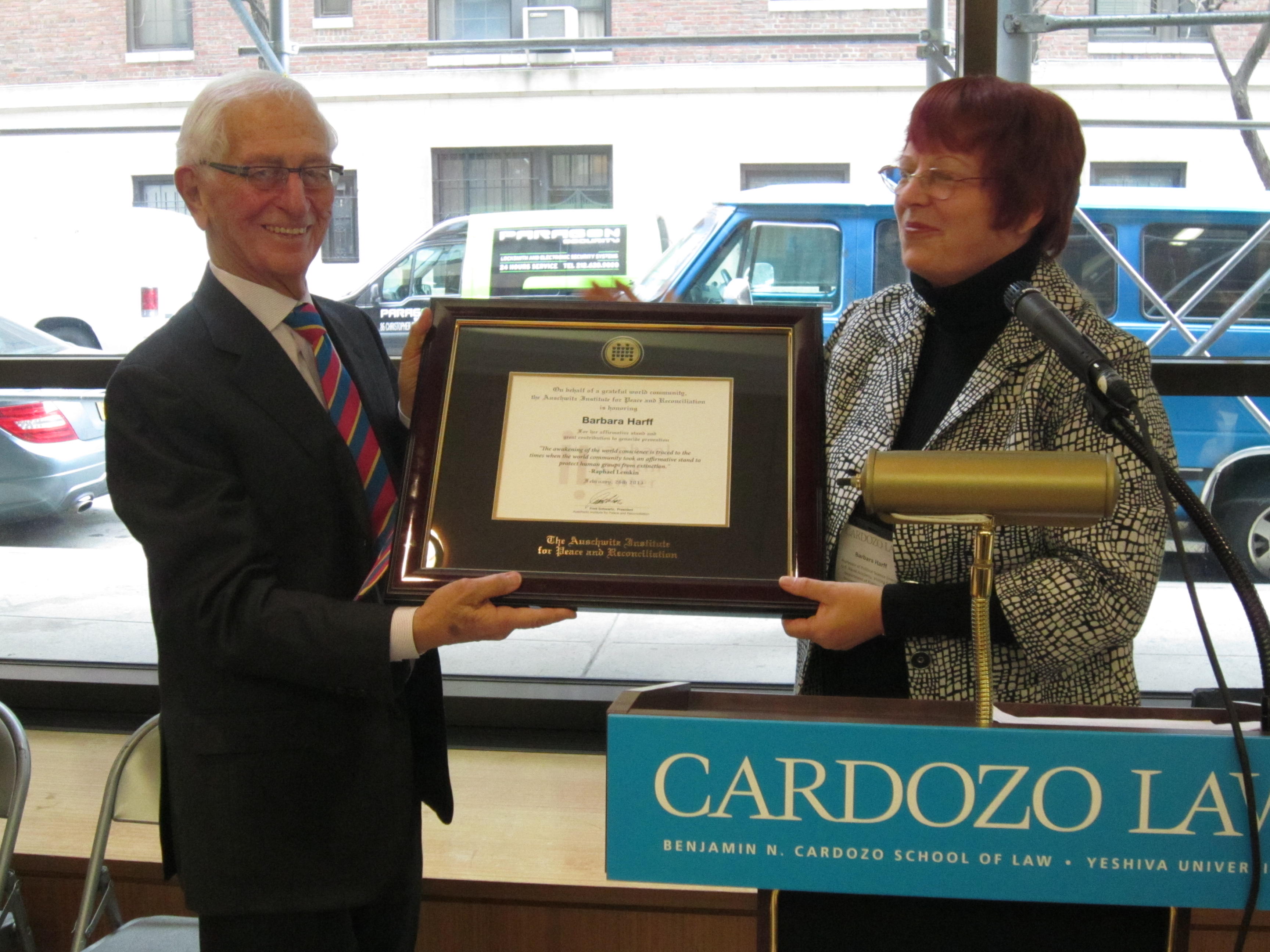 Barbara Harff accepts Raphael Lemkin Prize from Auschwitz Institute president Fred Schwartz